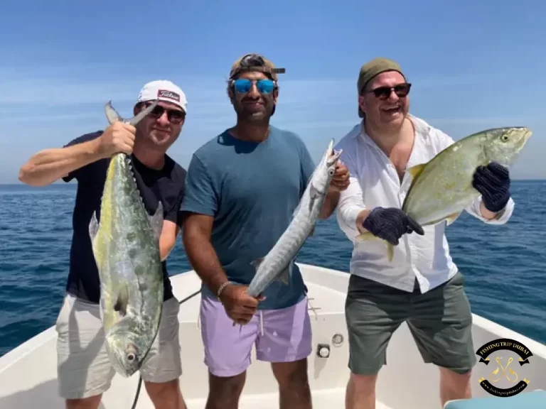 Gallery 5 3 guys holding their caught fish with fishing trip Dubai