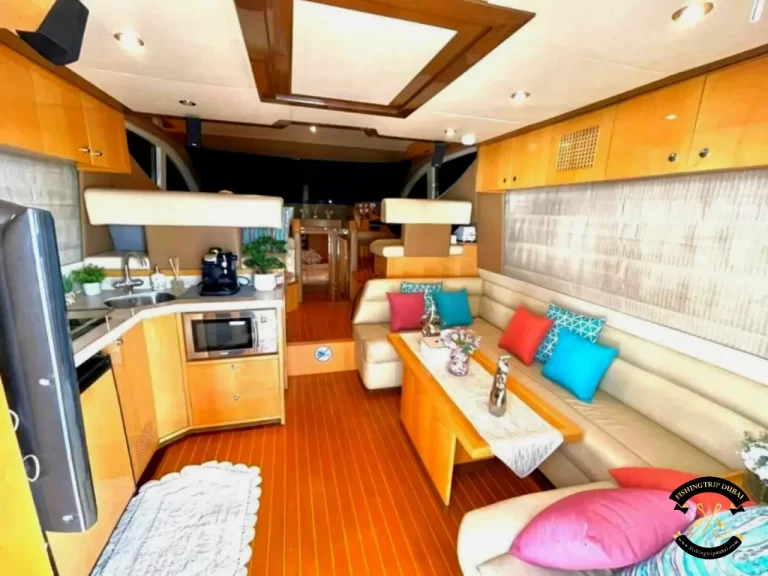 fishing trip Dubai. Majesty 44 ft interior view with living room setting and kitchen.