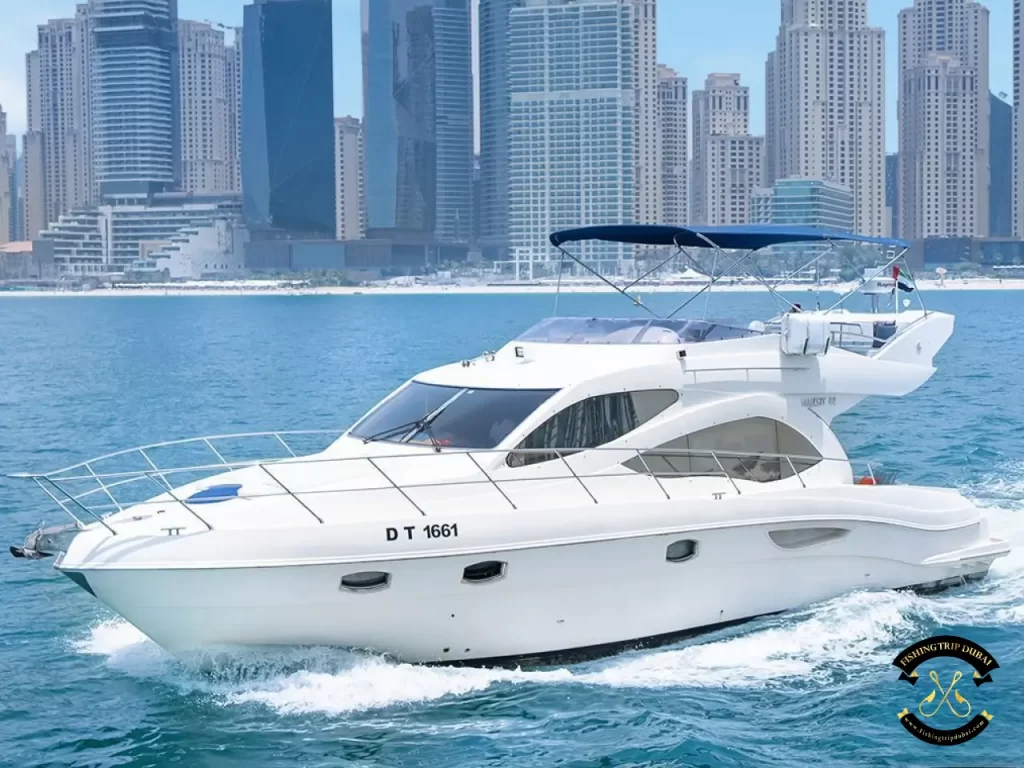 fishing trip Dubai. Majesty 44 ft cruising the waters of Dubai with the front view of the boat.