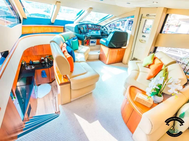 fishing trip Dubai. Sunseeker 70 ft interior with captain seat.