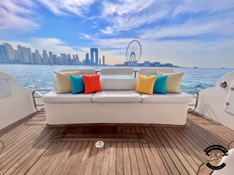 fishing trip Dubai. Majesty 48 FT sofa with pillows Dubai eye at the view.