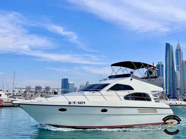 fishing trip Dubai. Majesty 48 FT full boat angled shot.