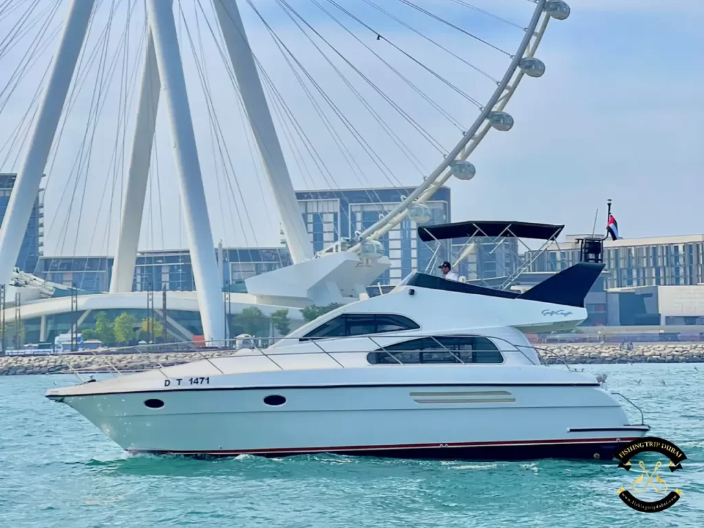 fishing trip Dubai. Majesty 48 FT side shot with Dubai eye in view.